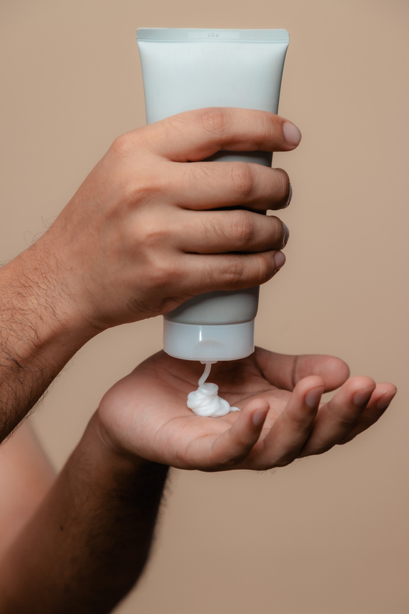 Man with Moisturizing Cream